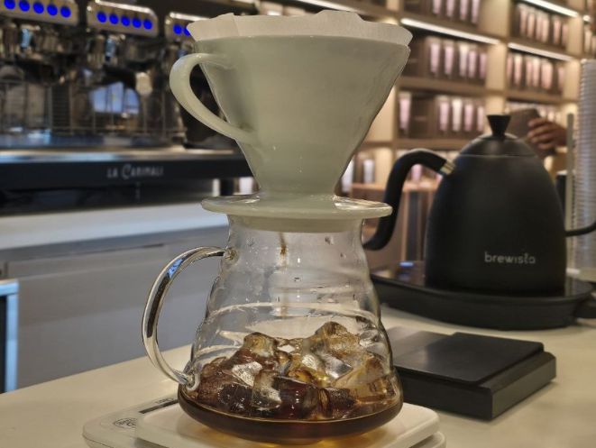 V60 pour over brewing coffee beans in Dubai